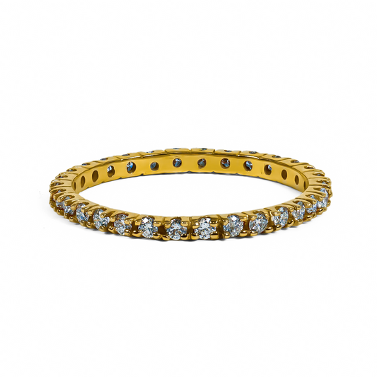 Anillo endless de Joyería Caracas, hecho de oro 18k, es una verdadera joya de lujo con diamantes incrustados. Con una garantía para toda la vida.