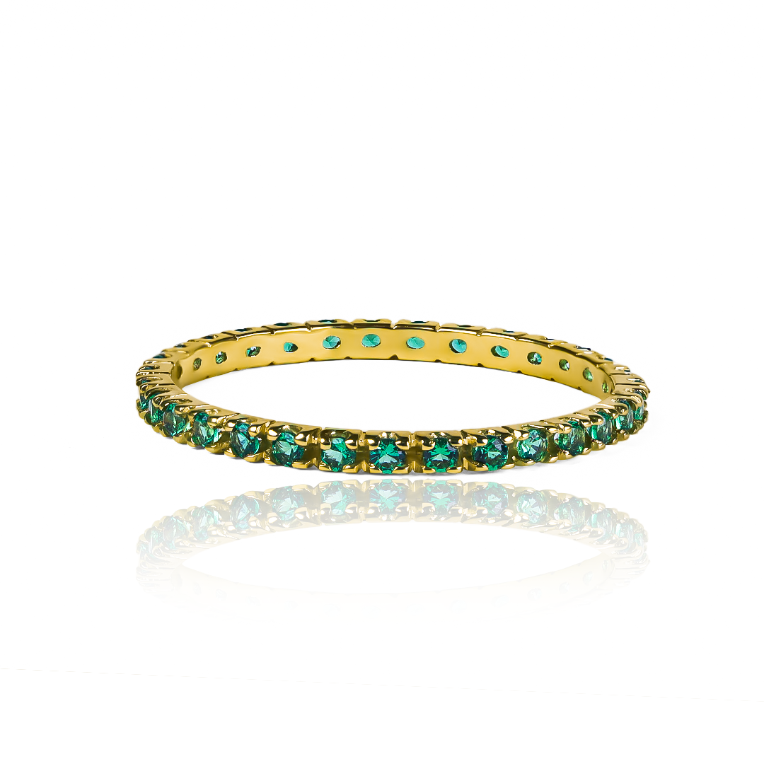 Anillo endless 1.5M green. Hecho con Joyería Caracas de oro 18k, este anillo representa la fuerza y la eternidad del amor. Con una garantía para toda la vida.