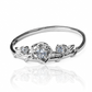 Anillo Espinas y Rosas M J, fabricado en oro 18k por Joyería Caracas, cuenta con certificado de calidad y garantía de por vida.