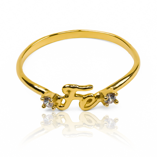  Anillo fe JT es una Joyería Caracas que simboliza elegancia y lujo. Hecho de oro 18k, es una pieza duradera y con garantía para toda la vida. 