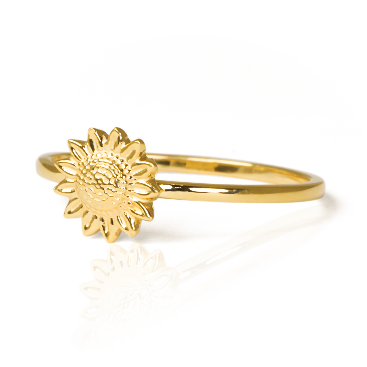 Anillo girasol S de Joyería Caracas está hecho de oro 18k. Además, cuenta con garantía de por vida.