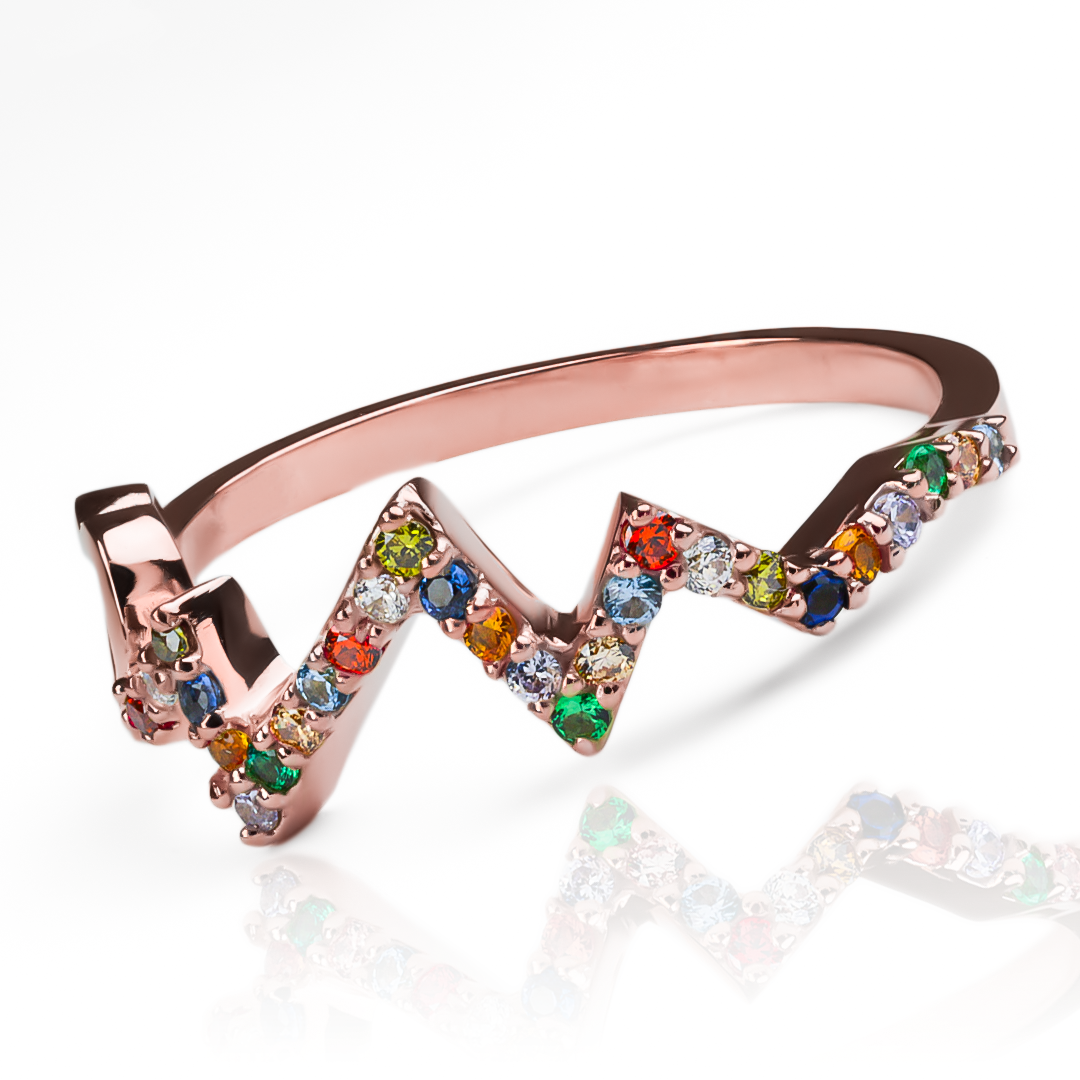 Anillo multicolor heart beat te robará el corazón. Hecho con oro 18k, esta Joyería Caracas es el epitome de lujo y estilo. Con una garantía para toda la vida.