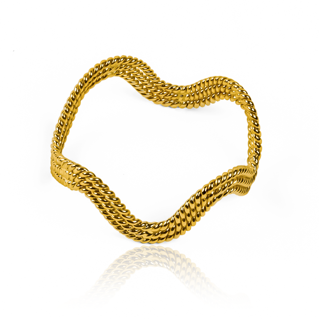 Anillo de Ondas entorchadas de Joyería Caracas. Hecho de oro 18k con una garantía para toda la vida.