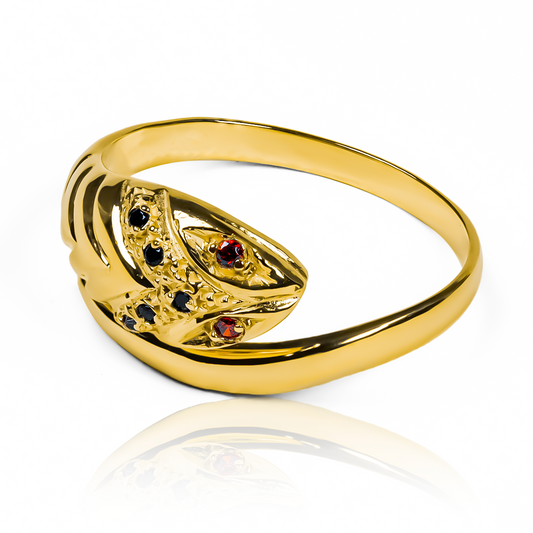  Anillo serpiente clásica de Joyería Caracas. Hecho de oro 18k, este anillo cuenta con un diseño clásico de serpiente y viene con una garantía para toda la vida. 