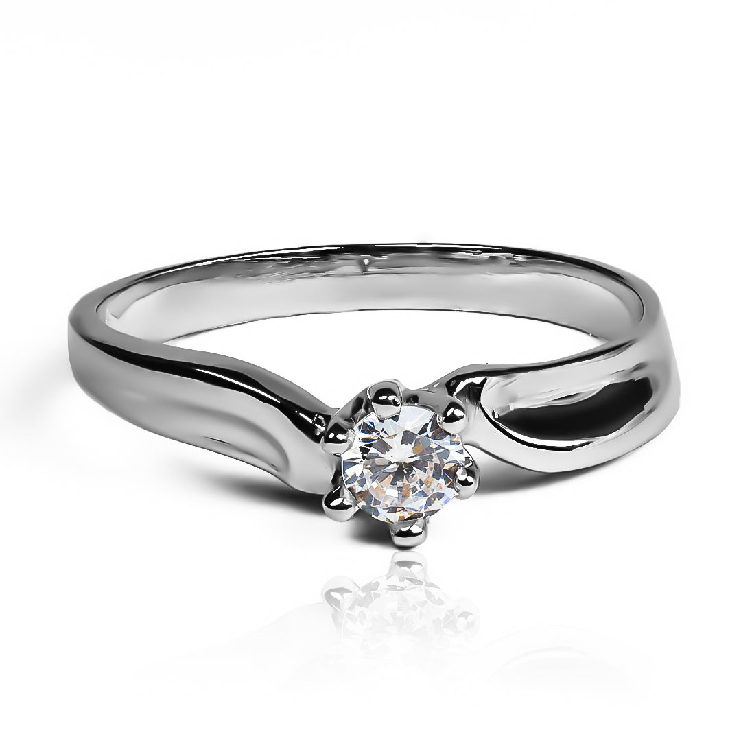 Anillo de compromiso wavy. Hecho en Joyería Caracas, este elegante anillo de oro 18k viene con un certificado de calidad y garantía de por vida.