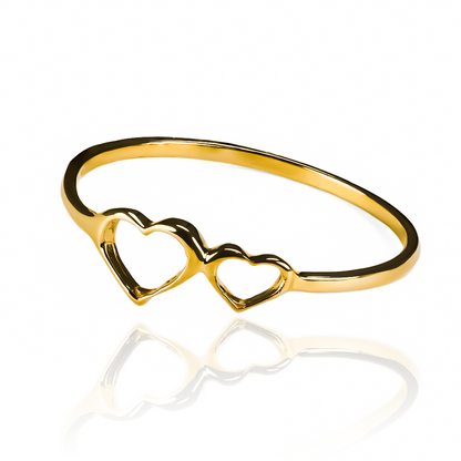 Anillo Twin Hearts, fabricado en oro 18k por Joyería Caracas, cuenta con certificado de calidad y garantía de por vida.