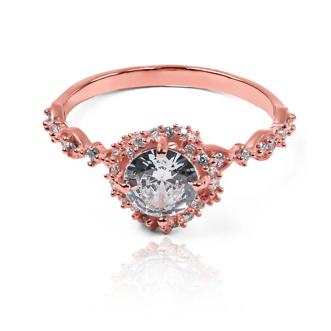 Anillo de compromiso entrelazado de Joyería Caracas con un hermoso diseño en oro 18k. Con certificado de calidad y garantía para toda la vida.