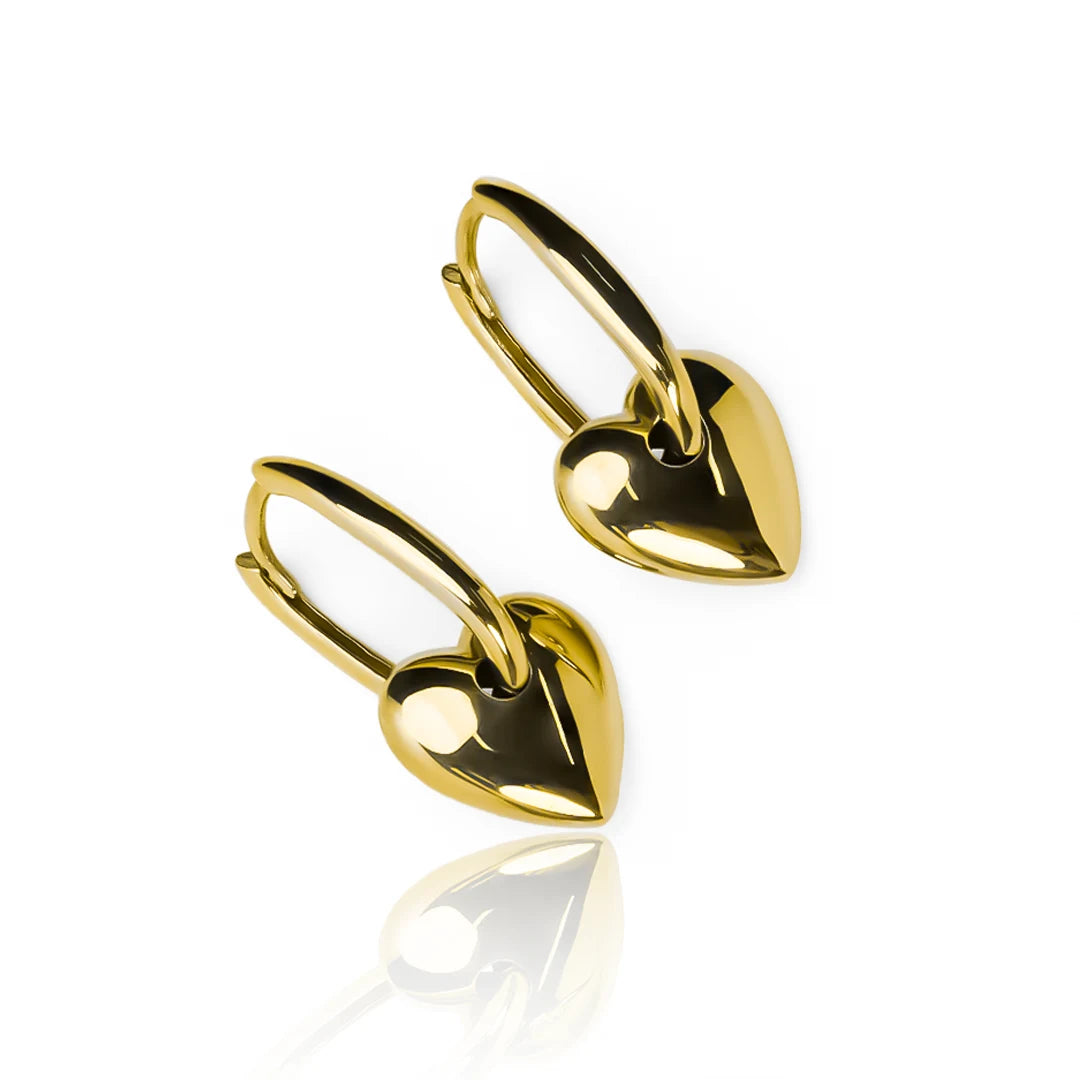 Candongas Arete Corazón, elaborada en oro 18k por Joyería Caracas. Además, cuenta con una garantía para toda la vida, asegurando su calidad y durabilidad.