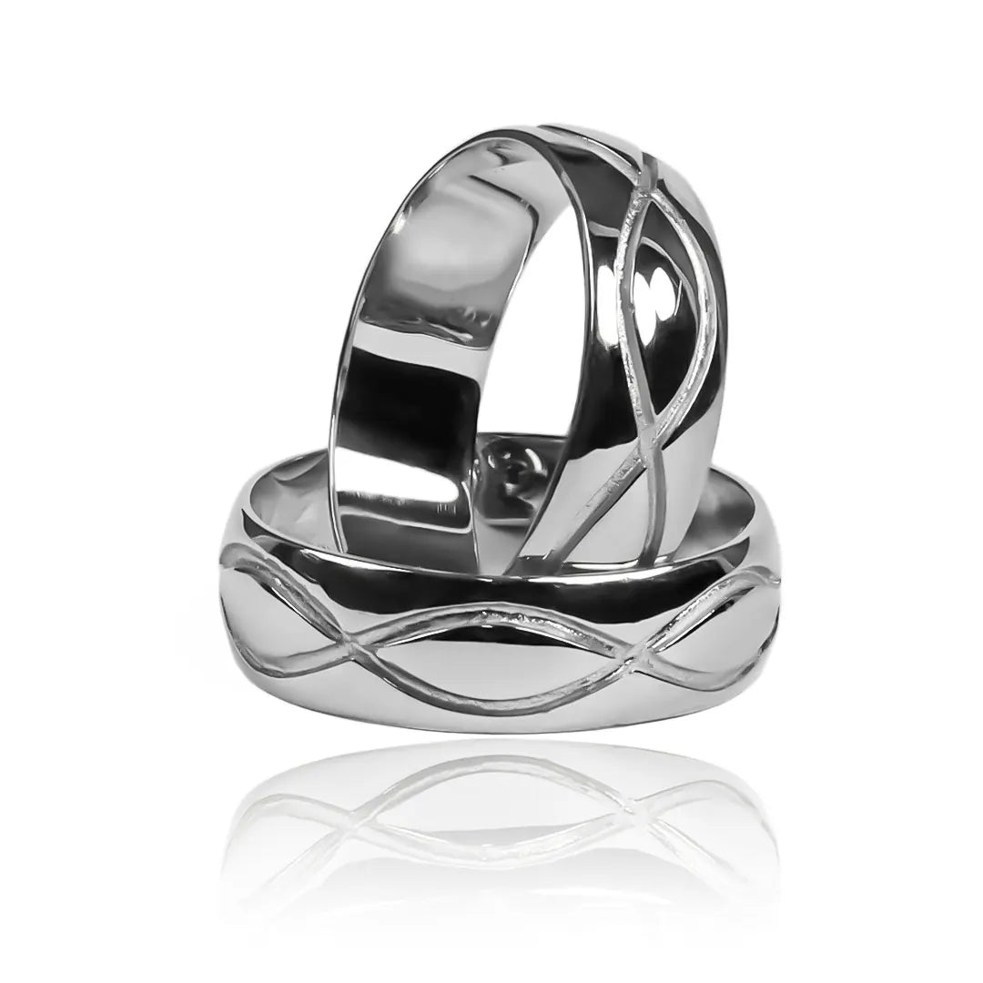 Argollas de matrimonio Infinite, fabricadas en oro de 18k por Joyería Caracas, cada argolla viene con un certificado de calidad y garantía para toda la vida.