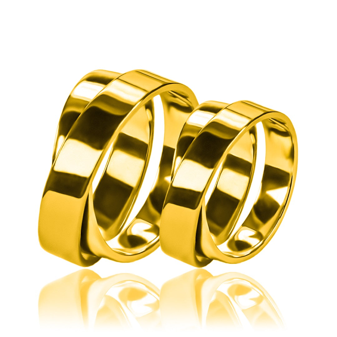Argollas de matrimonio Amor Por Dos, fabricados en oro 18k de Joyería Caracas, cada argolla viene con un certificado de calidad y una garantía de por vida.