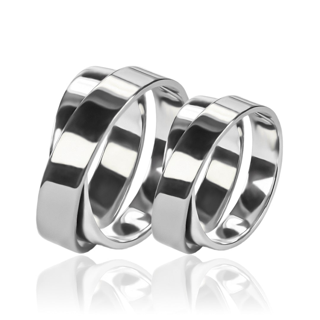 Argollas de matrimonio Amor Por Dos, fabricados en oro 18k de Joyería Caracas, cada argolla viene con un certificado de calidad y una garantía de por vida.