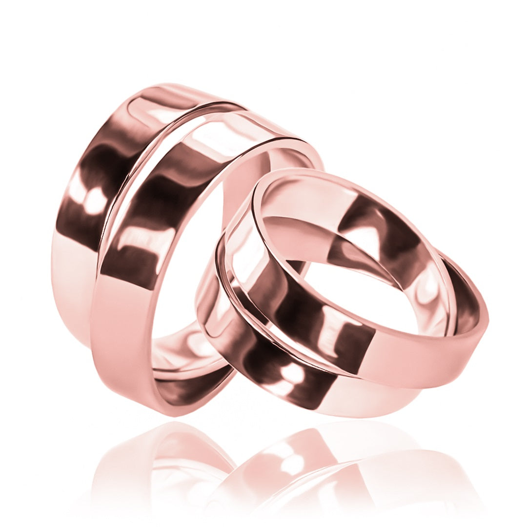 Argollas de matrimonio Amor Por Dos, fabricados en oro 18k de Joyería Caracas, cada argolla viene con un certificado de calidad y una garantía de por vida.
