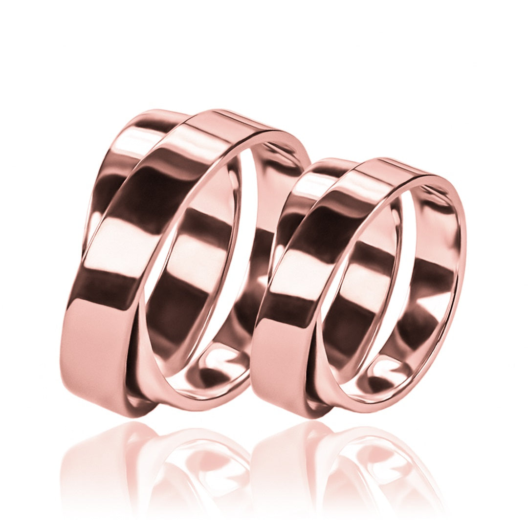 Argollas de matrimonio Amor Por Dos, fabricados en oro 18k de Joyería Caracas, cada argolla viene con un certificado de calidad y una garantía de por vida.