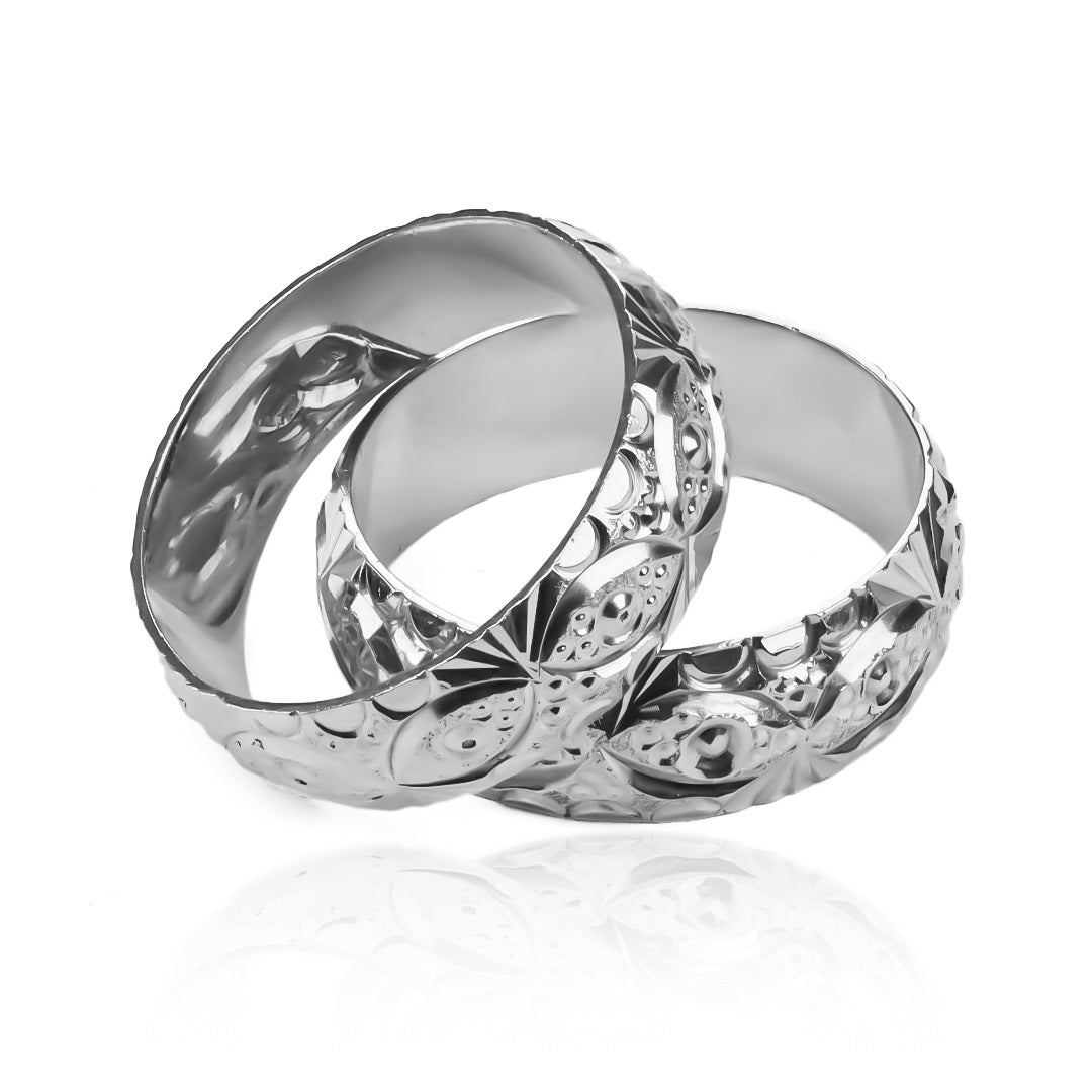 Argollas de matrimonio Antifaz, elaboradas en oro 18k, cuentan con un certificado de calidad y garantía de por vida.