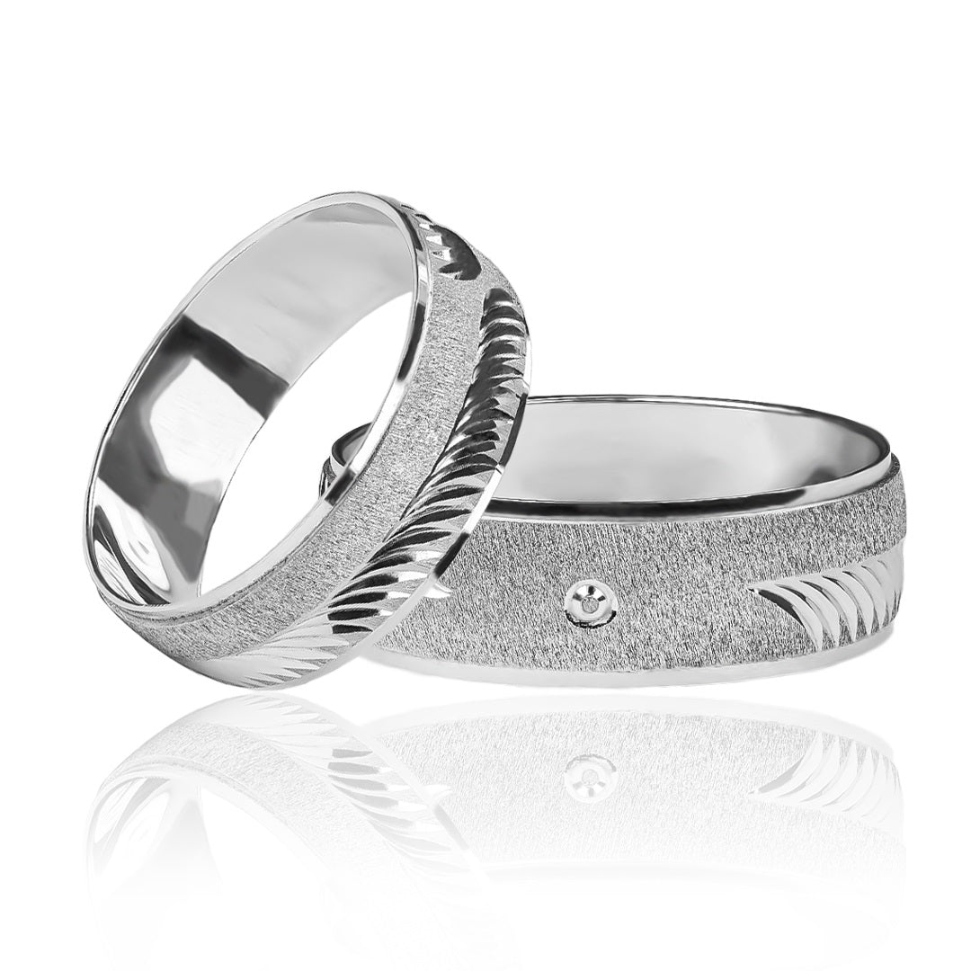 Argollas de matrimonio Blade, elaboradas en oro 18k por Joyería Caracas, cuentan con certificado de calidad y garantía de por vida.