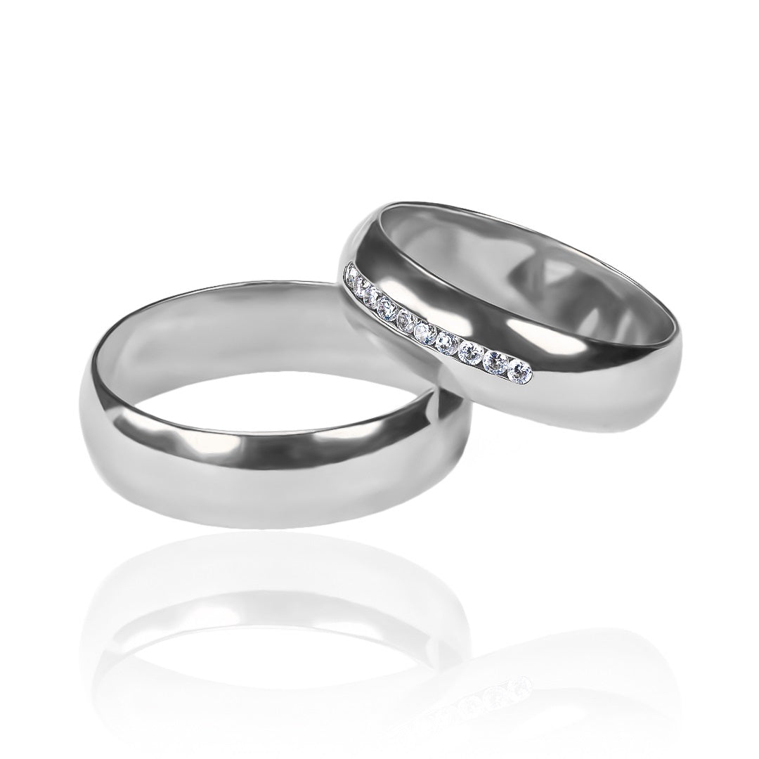 anillos de boda clásicos carré cristal en oro de 18k. La Joyería Caracas es reconocida por su artesanía de alta calidad, y estos anillos no son la excepción. Cada anillo viene con un certificado de calidad y garantía para toda la vida