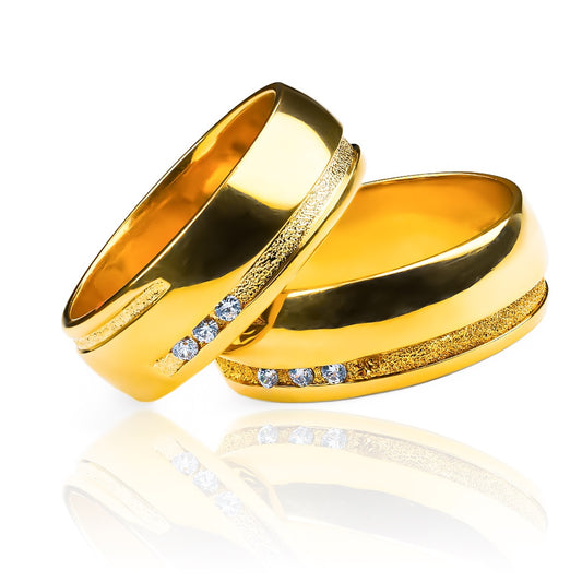 Argollas de matrimonio doble línea, elaborados en oro 18k por Joyería Caracas, cada argolla incluye un certificado de calidad y garantía para toda la vida.