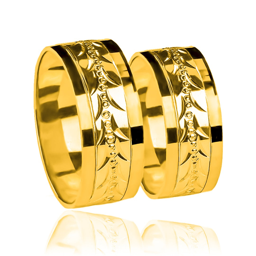Argollas de matrimonio Espiga Torcida Bicolor XL, fabricadas en oro 18 quilates, cuentan con un certificado de calidad y garantía de por vida que garantiza su valor y durabilidad.