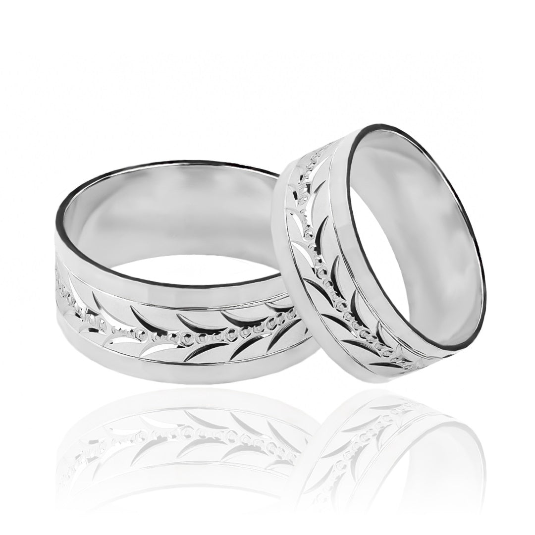 Argollas de matrimonio Espiga Torcida Bicolor XL, fabricadas en oro 18 quilates, cuentan con un certificado de calidad y garantía de por vida que garantiza su valor y durabilidad.