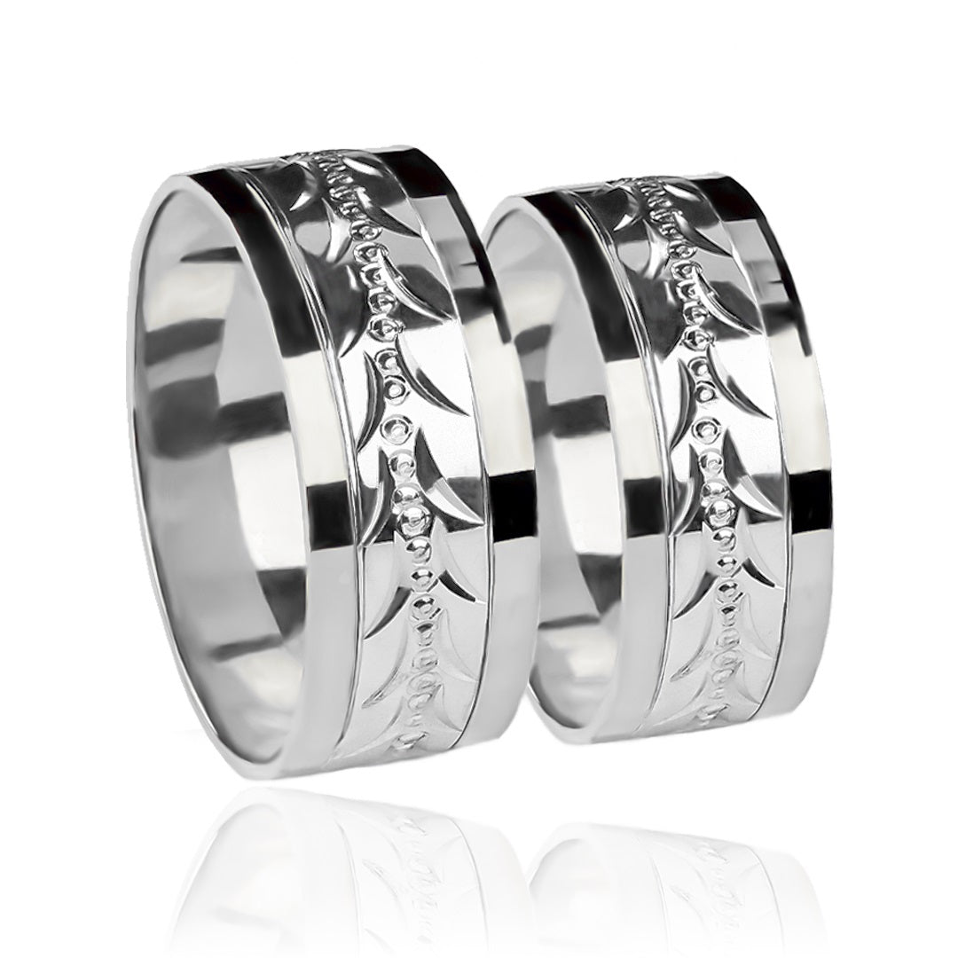 Argollas de matrimonio Espiga Torcida Bicolor XL, fabricadas en oro 18 quilates, cuentan con un certificado de calidad y garantía de por vida que garantiza su valor y durabilidad.