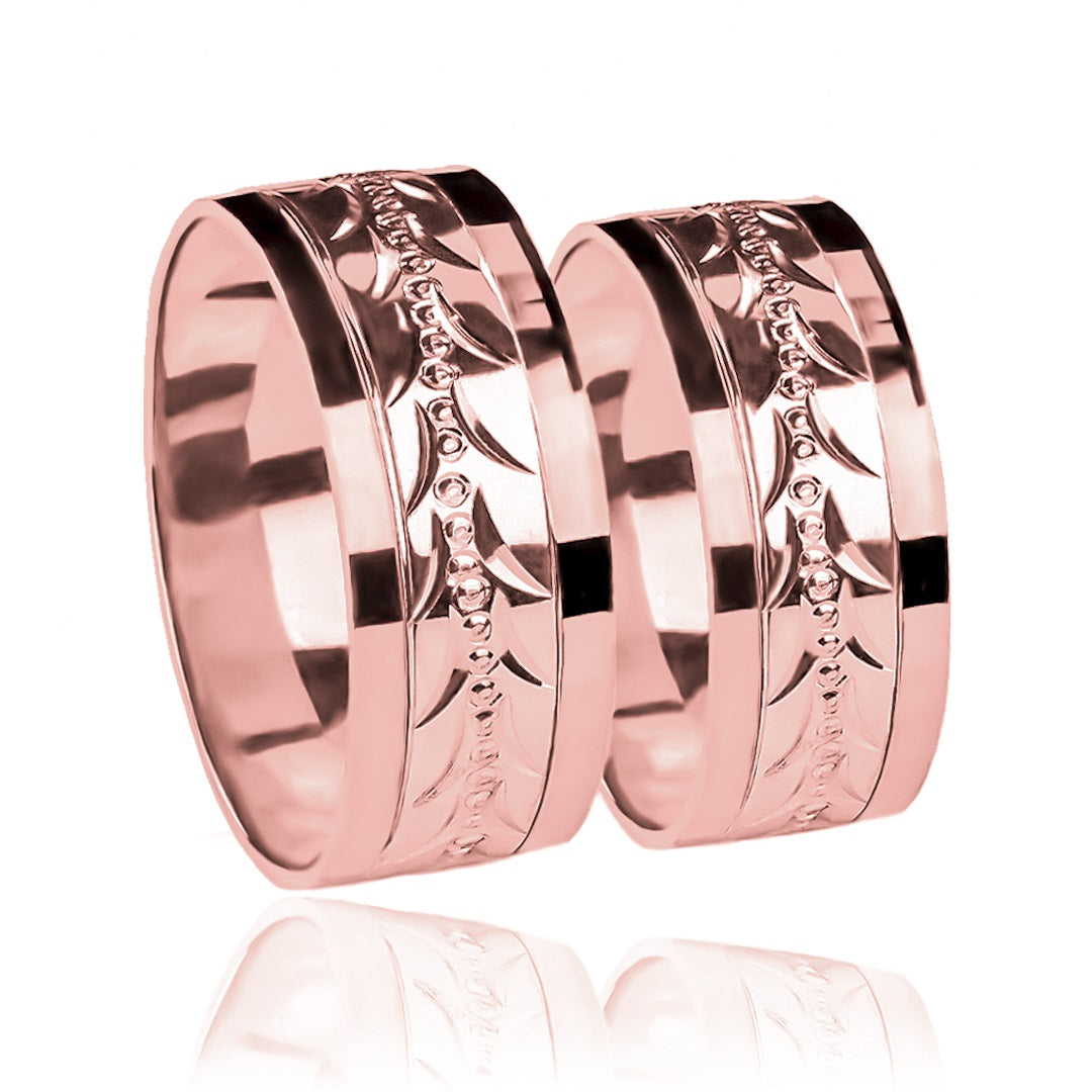 Argollas de matrimonio Espiga Torcida Bicolor XL, fabricadas en oro 18 quilates, cuentan con un certificado de calidad y garantía de por vida que garantiza su valor y durabilidad.
