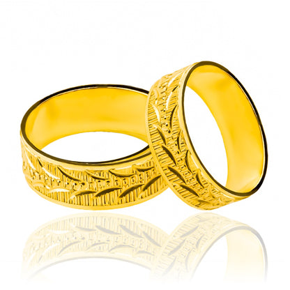 Argollas de matrimonio Espiga Torcida Fondo Rayado, elaboradas en oro 18 quilates, cuentan con un certificado de calidad y garantía de por vida.