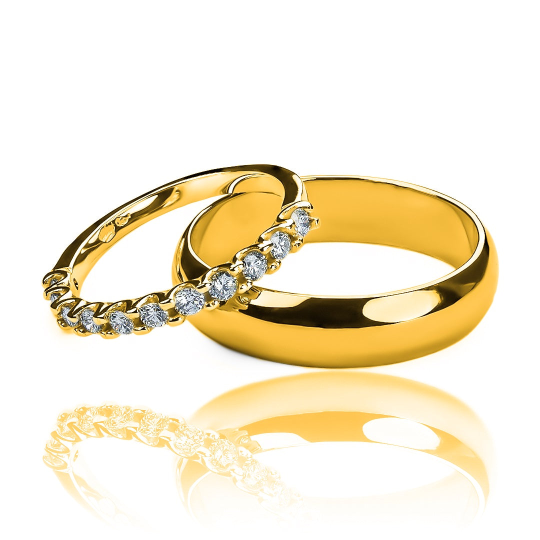 Argollas de matrimonio Fashion Love en oro 18k por Joyería Caracas, viene con certificado de calidad y garantía para toda la vida.