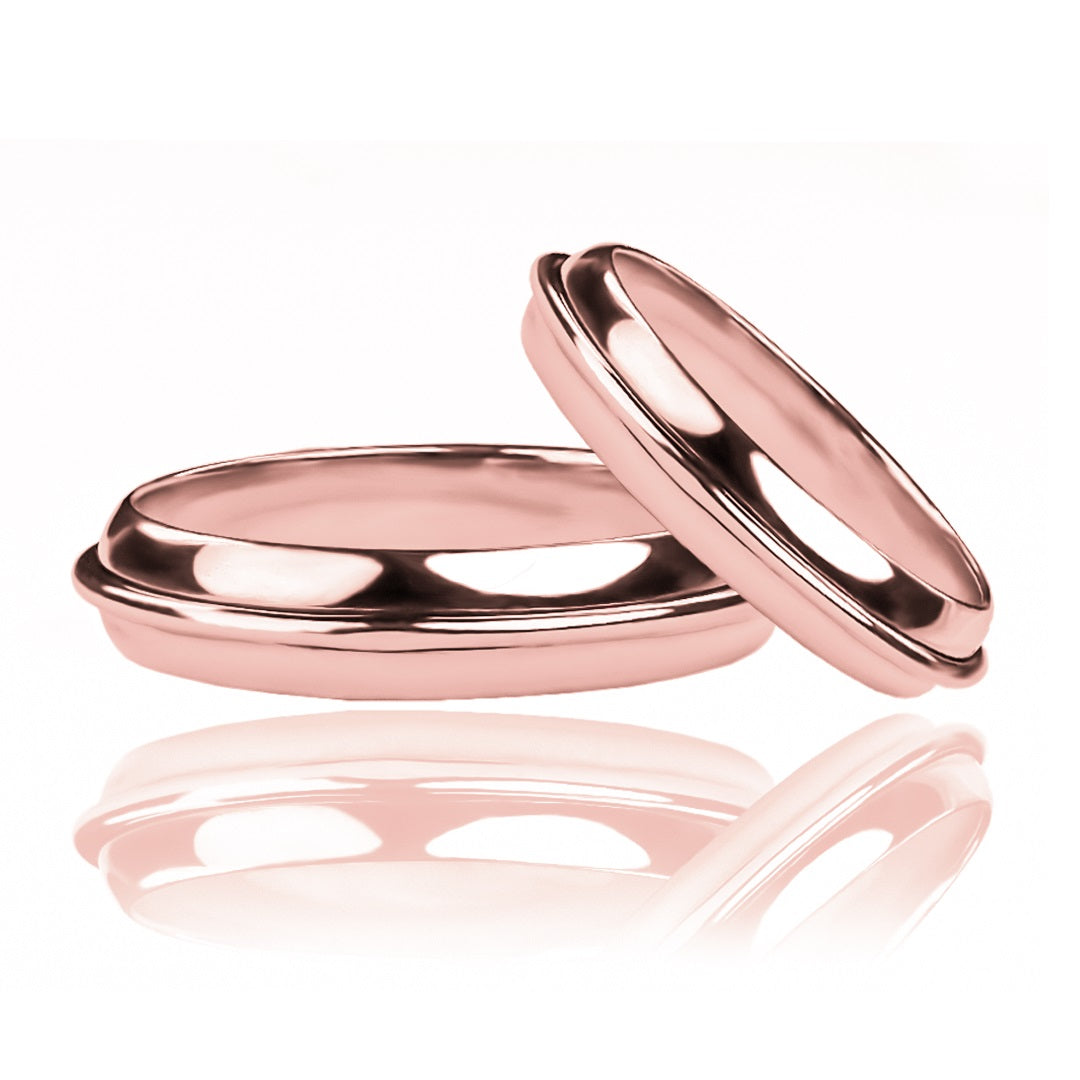 Argollas de matrimonio Floating Love, elaboradas en oro 18k por Joyería Caracas, cada una cuenta con certificado de calidad y garantía de por vida.