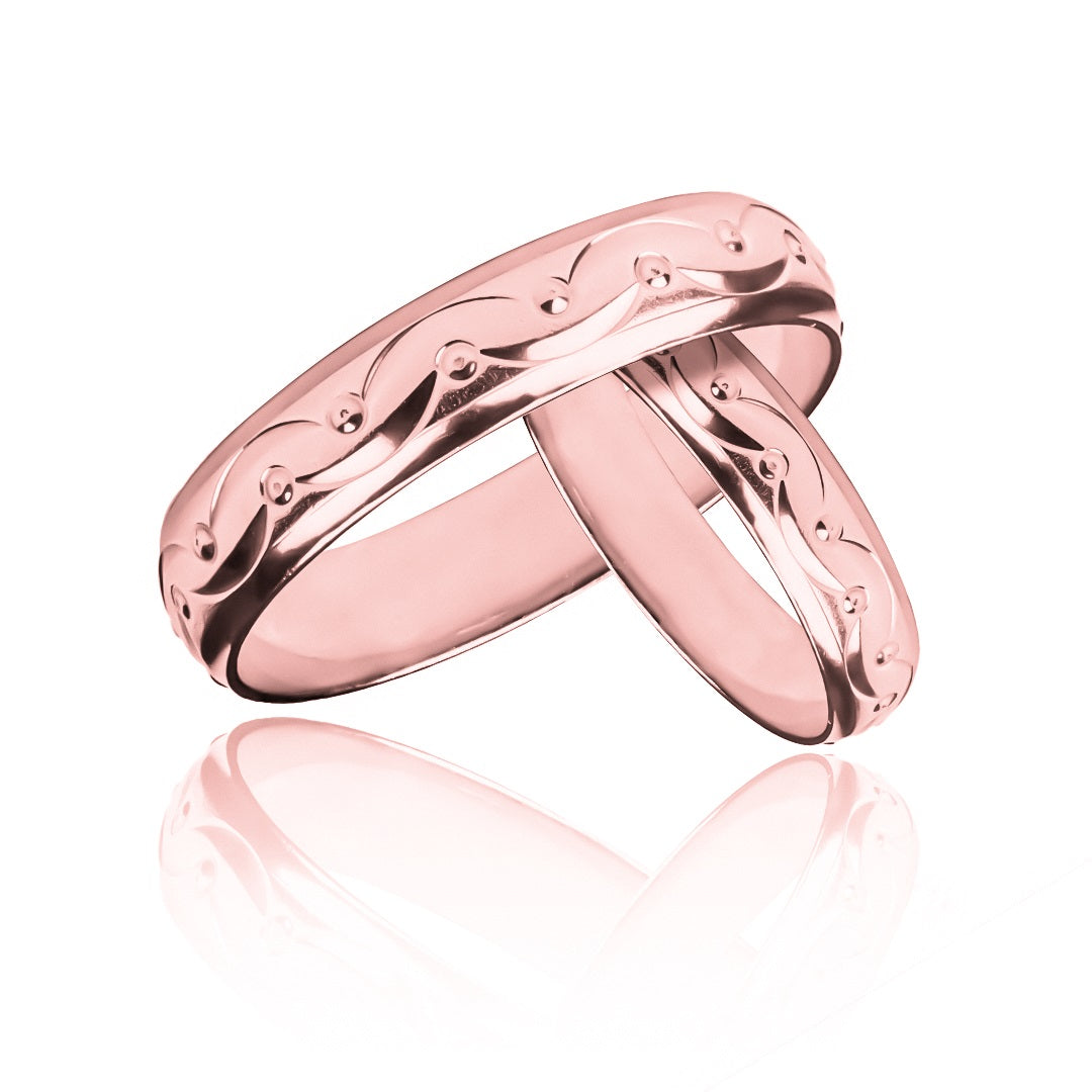 Argollas de matrimonio Happy Love, elaboradas en oro 18k por Joyería Caracas, cada una cuenta con un certificado de calidad y garantía de por vida.
