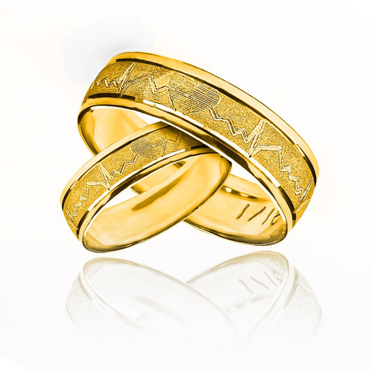 Argollas de matrimonio Heart Rate, elaboradas en oro 18k por Joyería Caracas, cada argolla viene con un certificado de calidad y garantía de por vida.