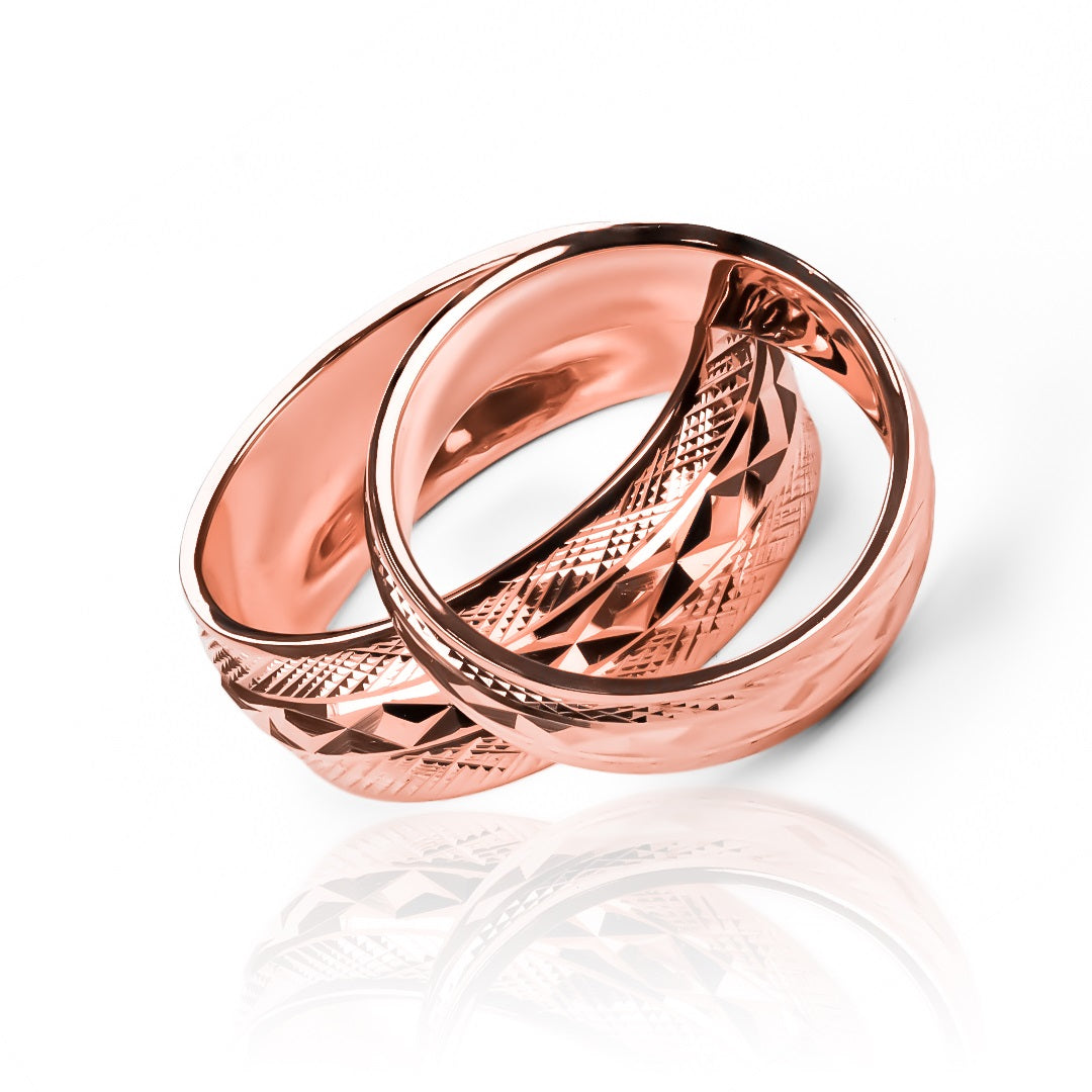 Argollas de matrimonio Joker, elaboradas en oro 18k por Joyería Caracas, cuentan con un certificado de calidad y garantía para toda la vida.