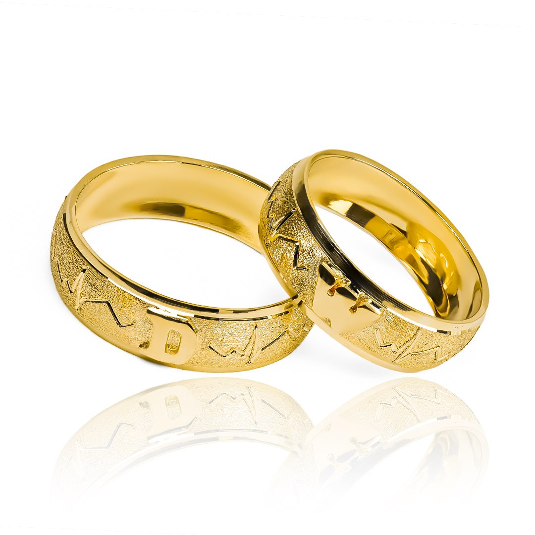 Argollas de matrimonio Latidos Iniciales & Corazones, fabricados en oro 18k por Joyería Caracas, cada una viene con un certificado de calidad y garantía para toda la vida.