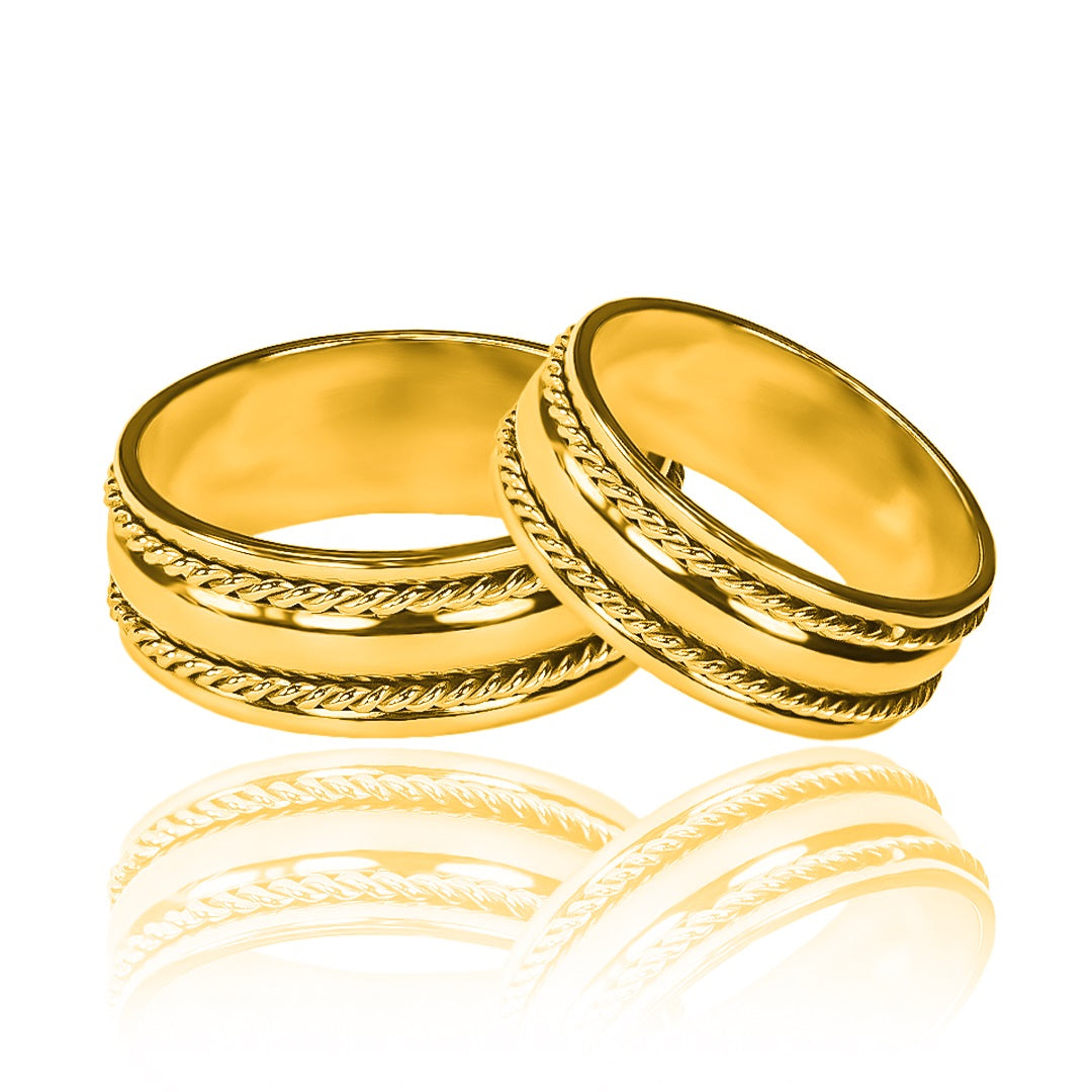 Argollas de matrimonio Lazo de Amor Bicolor, elaboradas en oro 18k de Joyería Caracas. Cada argolla viene acompañada de un certificado de autenticidad y garantía para toda la vida.