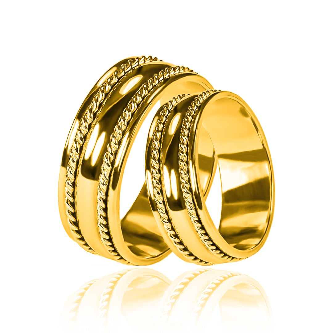 Argollas de matrimonio Lazo de Amor Bicolor, elaboradas en oro 18k de Joyería Caracas. Cada argolla viene acompañada de un certificado de autenticidad y garantía para toda la vida.