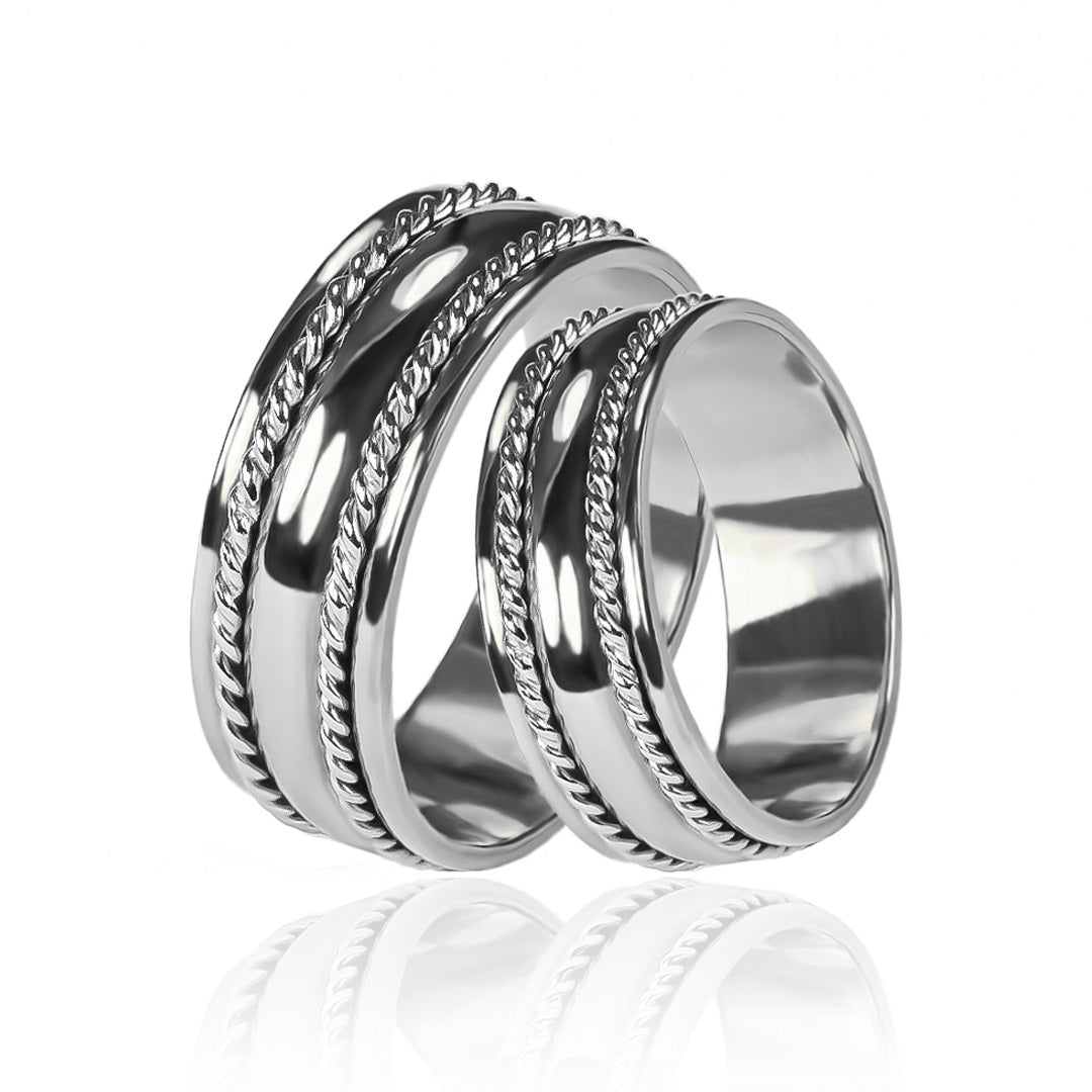 Argollas de matrimonio Lazo de Amor Bicolor, elaboradas en oro 18k de Joyería Caracas. Cada argolla viene acompañada de un certificado de autenticidad y garantía para toda la vida.