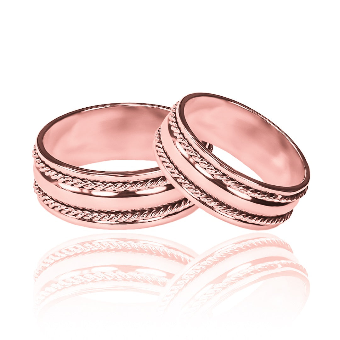 Argollas de matrimonio Lazo de Amor Bicolor, elaboradas en oro 18k de Joyería Caracas. Cada argolla viene acompañada de un certificado de autenticidad y garantía para toda la vida.