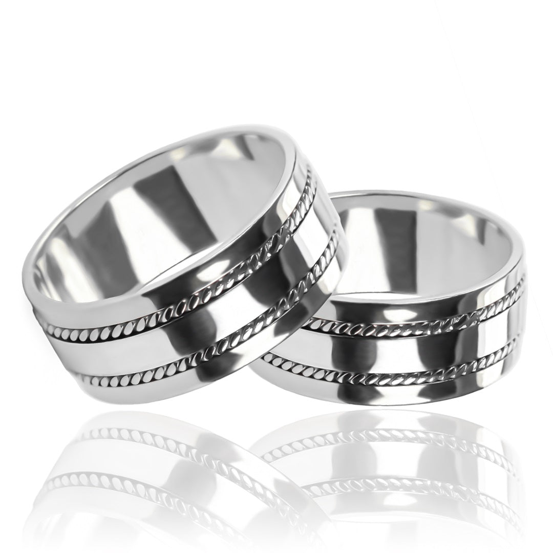 Argollas de matrimonio lazos de amor plane, elaboradas en oro 18k de Joyería Caracas, cada una cuenta con certificado de calidad y garantía de por vida.