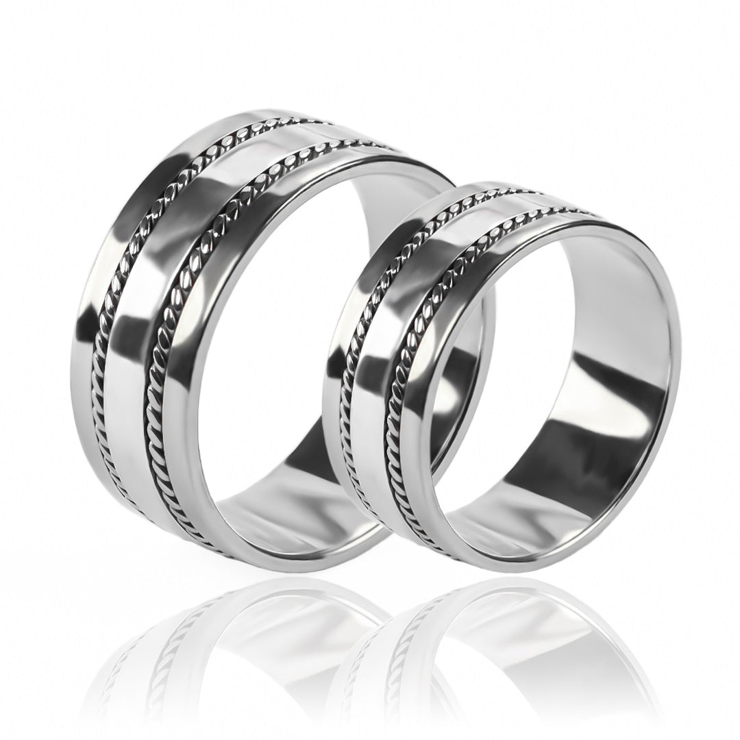 Argollas de matrimonio lazos de amor plane, elaboradas en oro 18k de Joyería Caracas, cada una cuenta con certificado de calidad y garantía de por vida.