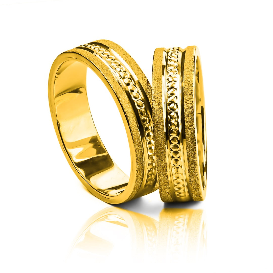 Argollas de matrimonio Love Point Tres Oros, elaboradas en oro 18k de Joyería Caracas, cuentan con certificado de calidad y garantía de por vida.