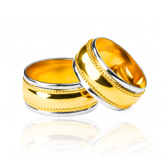 Argollas de matrimonio masa + bisel, elaborados en oro 18k por Joyería Caracas, cada argolla cuenta con certificado de calidad y garantía de por vida.