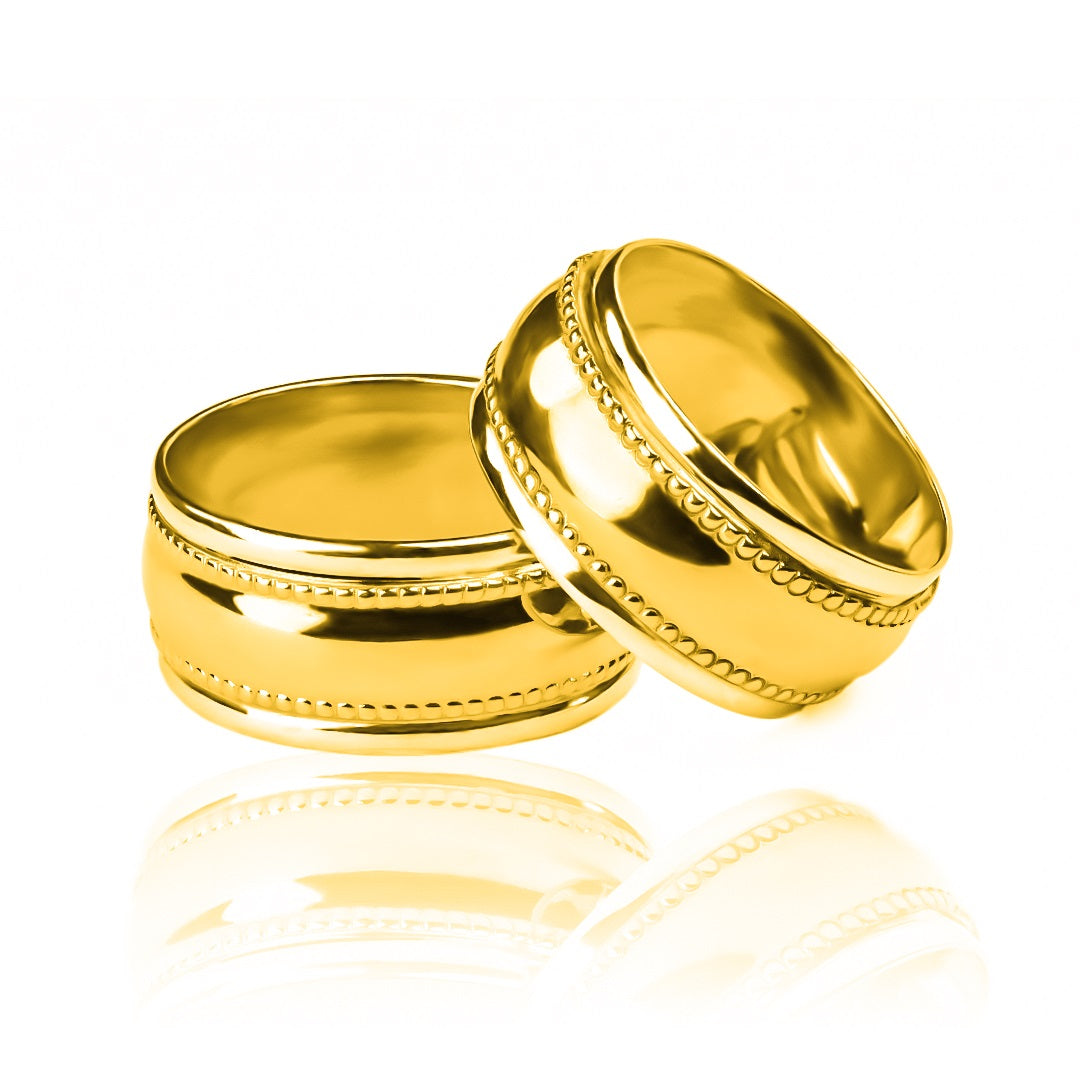 Argollas de matrimonio masa + bisel, elaborados en oro 18k por Joyería Caracas, cada argolla cuenta con certificado de calidad y garantía de por vida.
