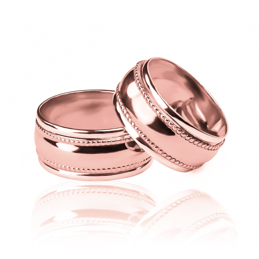 Argollas de matrimonio masa + bisel, elaborados en oro 18k por Joyería Caracas, cada argolla cuenta con certificado de calidad y garantía de por vida.