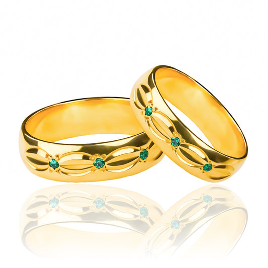 Argollas de matrimonio Sheet Green Cristal, elaboradas en oro 18k por Joyería Caracas, cada argolla viene con un certificado de calidad y garantía de por vida.