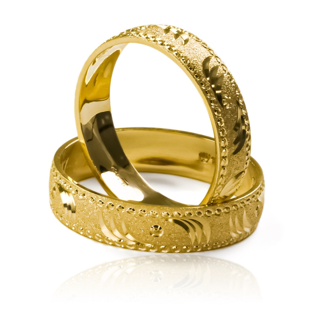 Argollas de matrimonio Tiger Cóncava, fabricadas en oro 18k por Joyería Caracas, vienen con certificado de calidad y garantía de por vida.