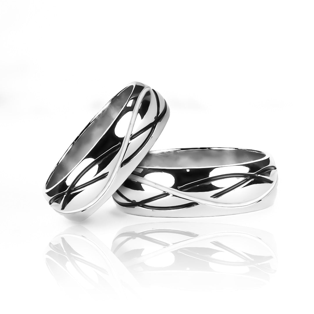 Argollas de matrimonio Yin Yang, elaboradas en oro 18k por Joyería Caracas, cuenta con certificado de calidad y garantía de por vida.