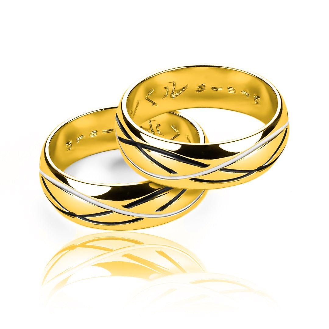 Argollas de matrimonio Yin Yang, elaboradas en oro 18k por Joyería Caracas, cuenta con certificado de calidad y garantía de por vida.