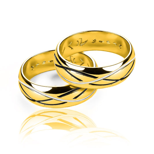 Argollas de matrimonio Yin Yang, elaboradas en oro 18k por Joyería Caracas, cuenta con certificado de calidad y garantía de por vida.