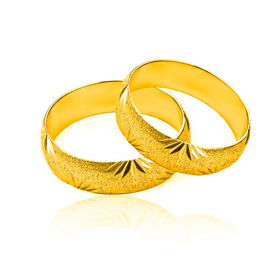 Argollas de matrimonio Bouquet, elaboradas en oro 18k por Joyería Caracas, cada una viene con un certificado de calidad y garantía para toda la vida.