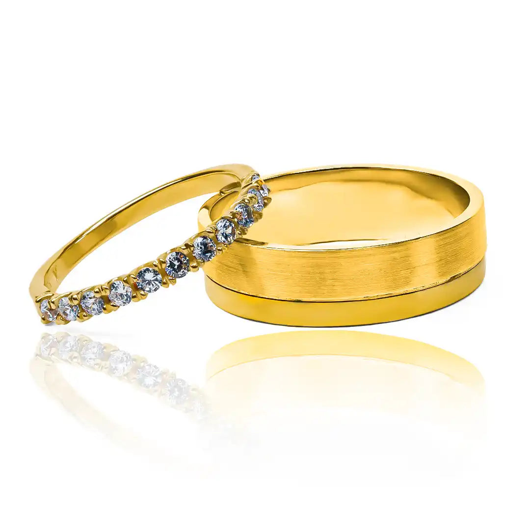 Argollas de matrimonio Two-Tone Crystals, fabricados en oro de 18k por Joyería Caracas, cuenta con certificado para garantizar su durabilidad y belleza.