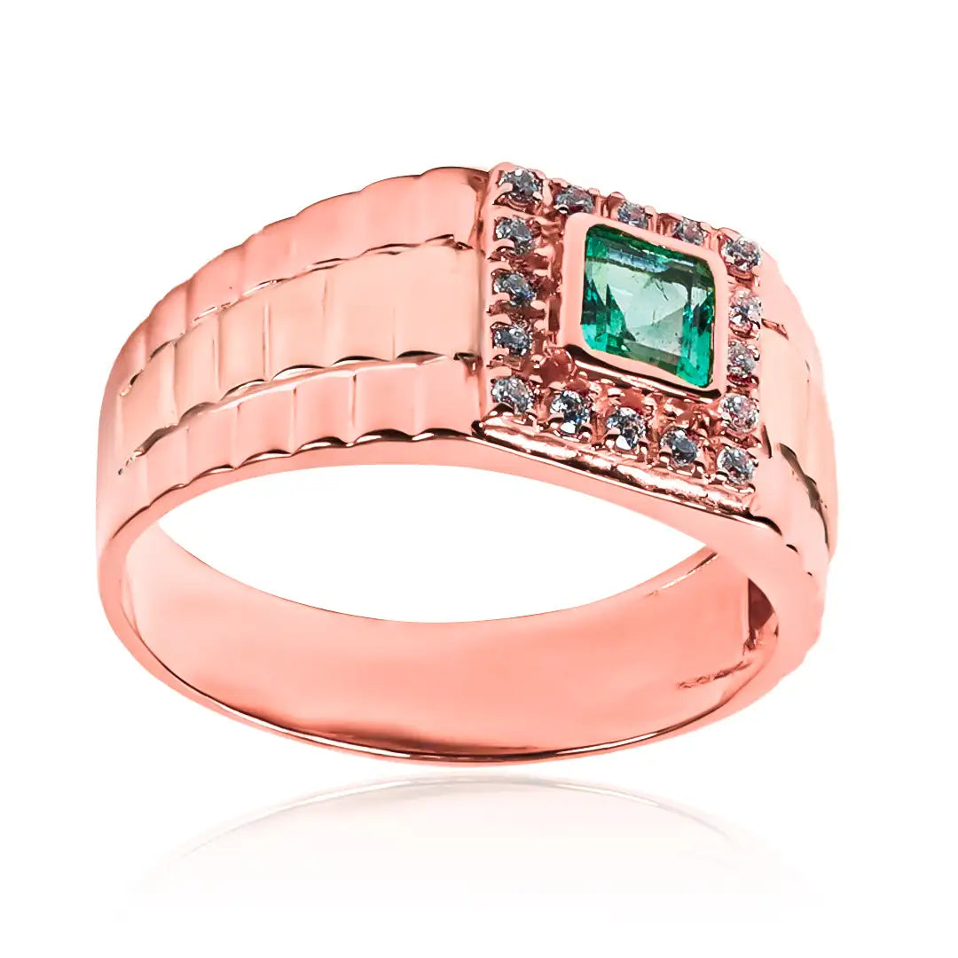 Anillo armis bicolor de oro 18k bicolor, adornado con una esmeralda de Joyería Caracas. Inspirado en la belleza de las piedras preciosas, garantizado de por vida.